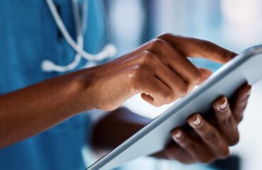 Doctor using a touch screen