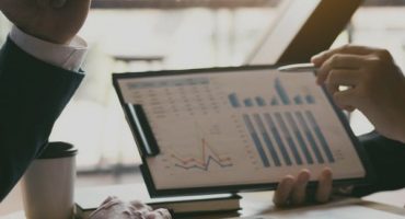 Financial Assessment Featured image Two business partnership coworkers