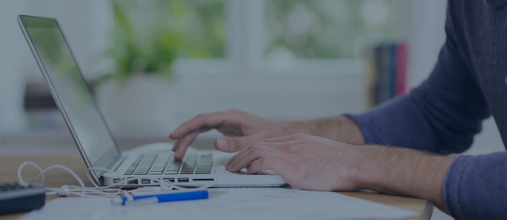 User completing e-learning on laptop
